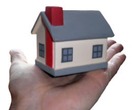 Casa pequeña sobre mano